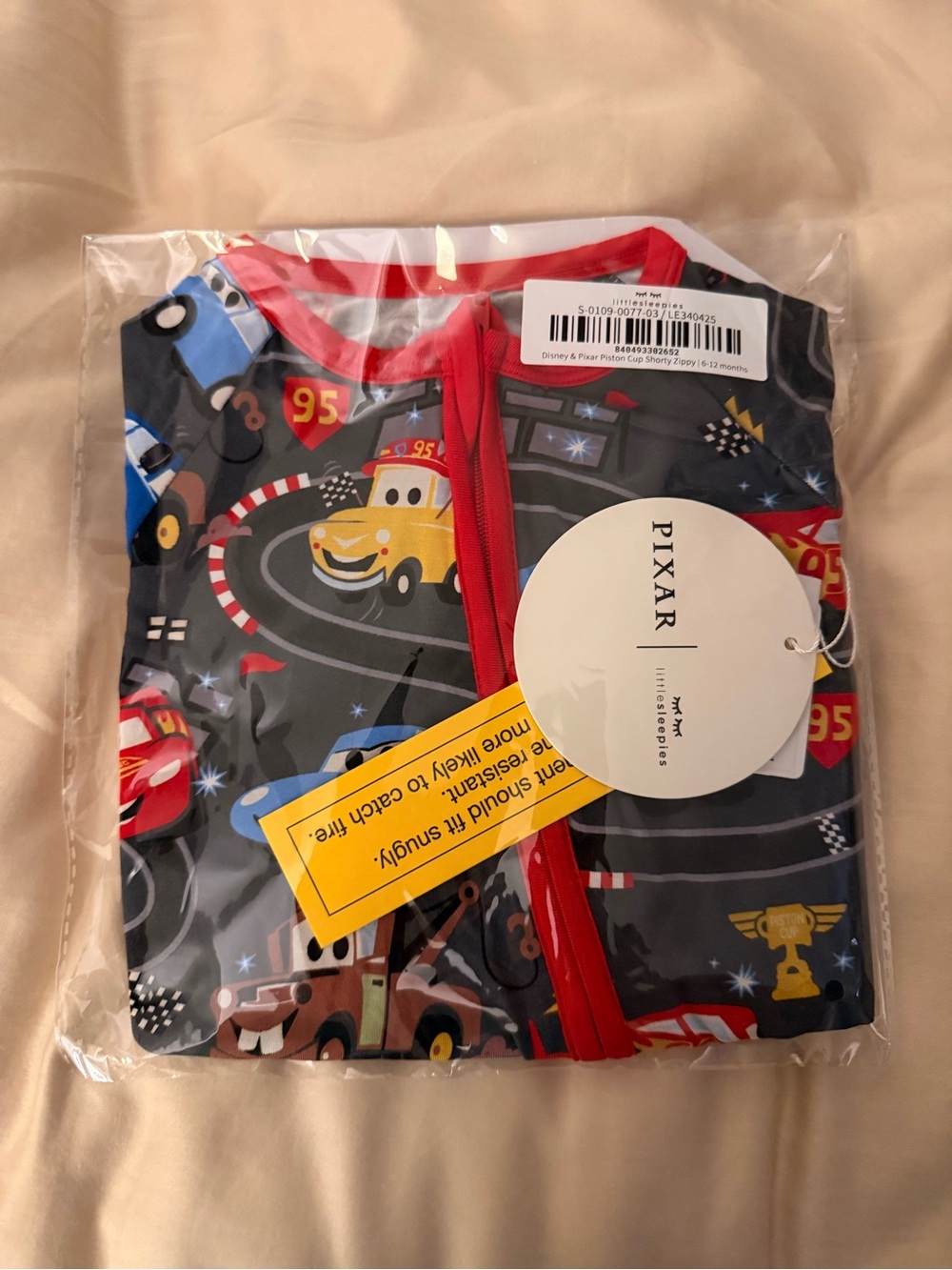 NIB Little Sleepies Pixar Cars “Piston Cup” shorty zippy